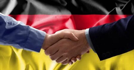 Swintt Enhances ZEAL Network’s Game Offering Handshake Business Deal Germany