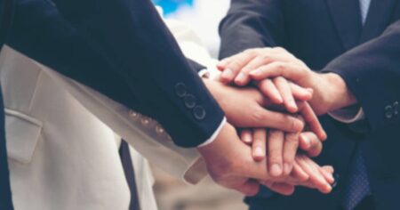 Business Team Joining Hands